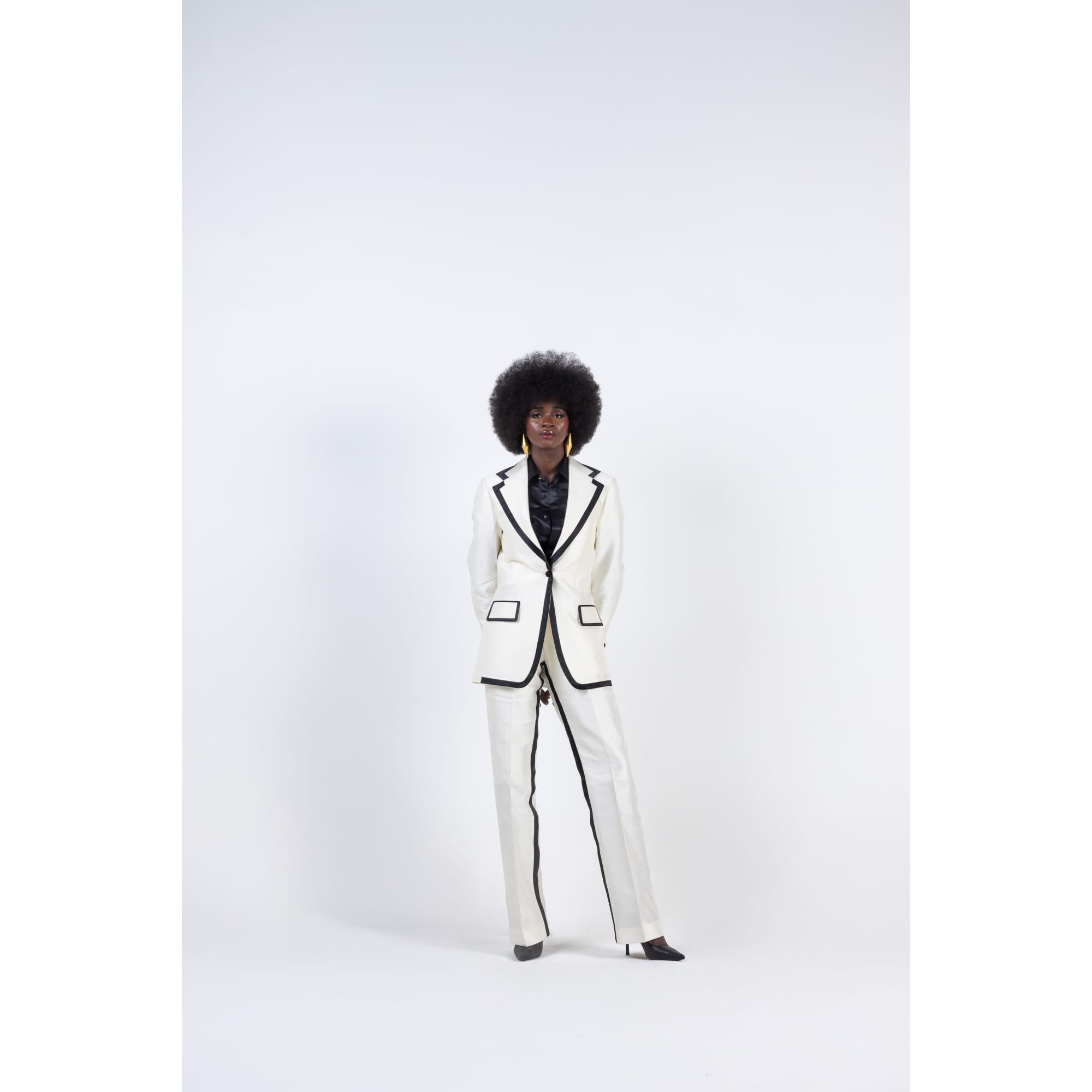 IVORY SUIT AND BLACK SATIN BIB TUXEDO SHIRT